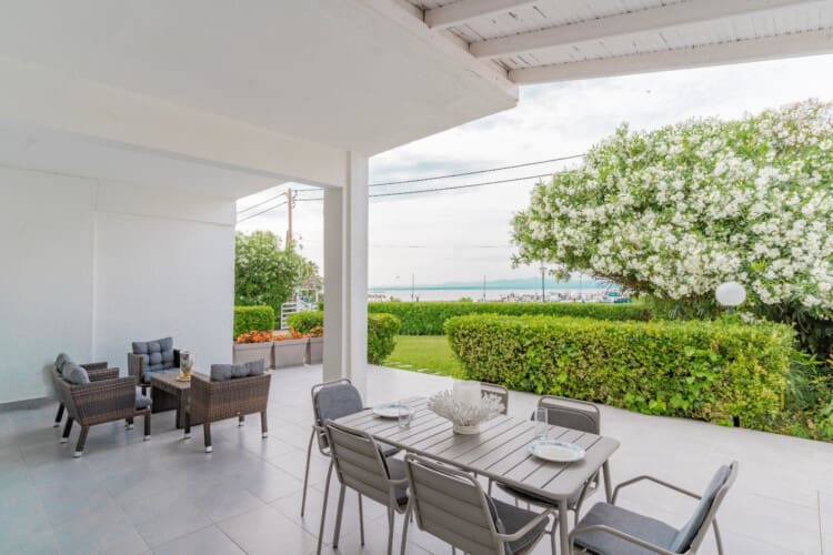 Living area and dining table with sea view