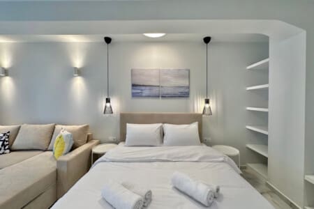 Double bed and seating area