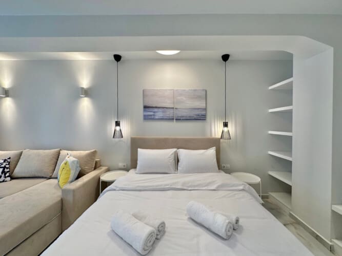 Double bed and seating area