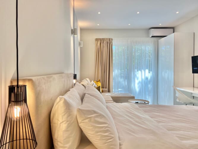 Double bed and seating area