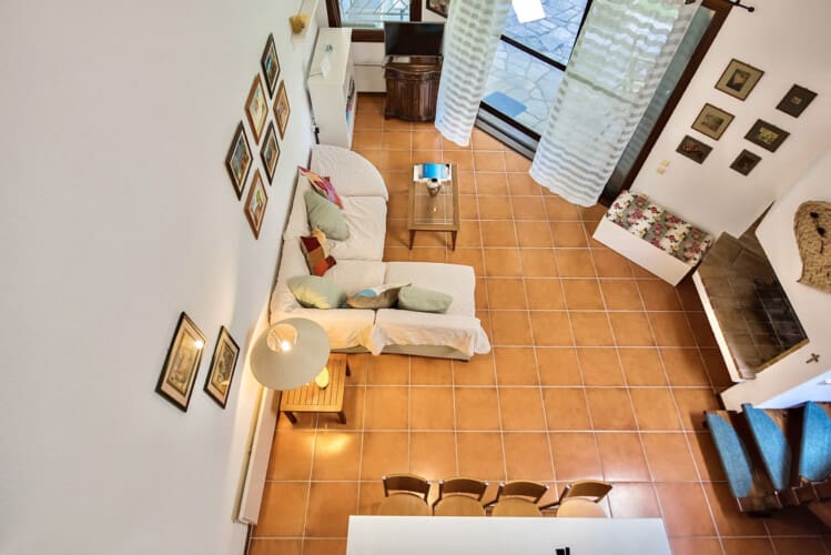 Living area with TV and fireplace